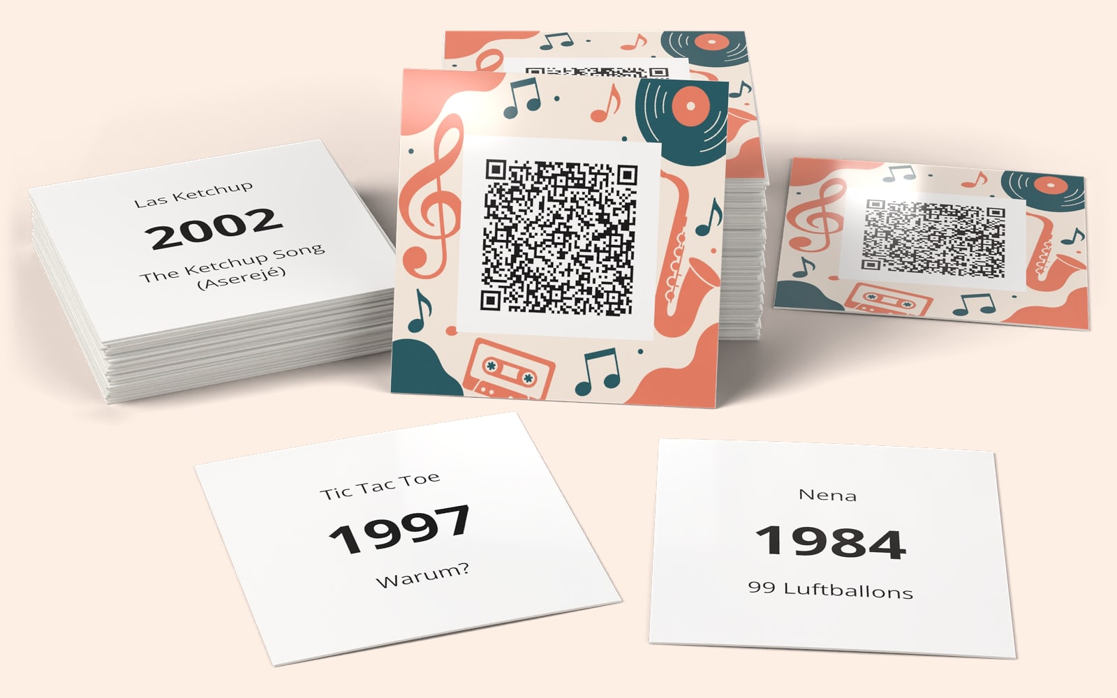 MusiのQRSong!ミュージックカード:QRコード付きのカードデザインと、各カード裏面のアーティスト、年、タイトル